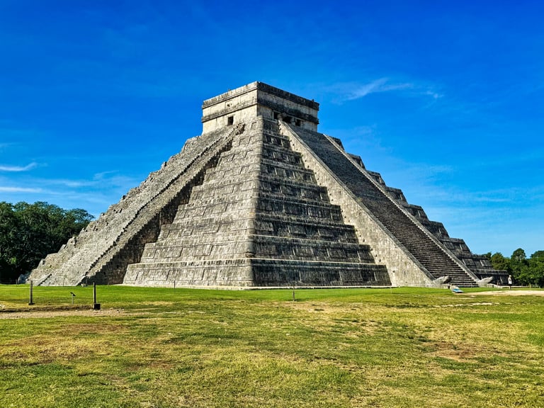Grand Temple Pyramid of Kukulcan, known as El Castillo, modern wonder of the world and pinnacle of Mayan architecture built in 10th cent AD in Chichen Itza, Yucatan, Mexico